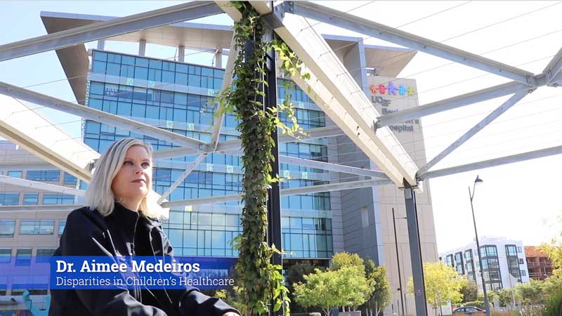 Disparities in Children's Healthcare - Dr. Aimee Medeiros in front of Benioff Children's Hospital